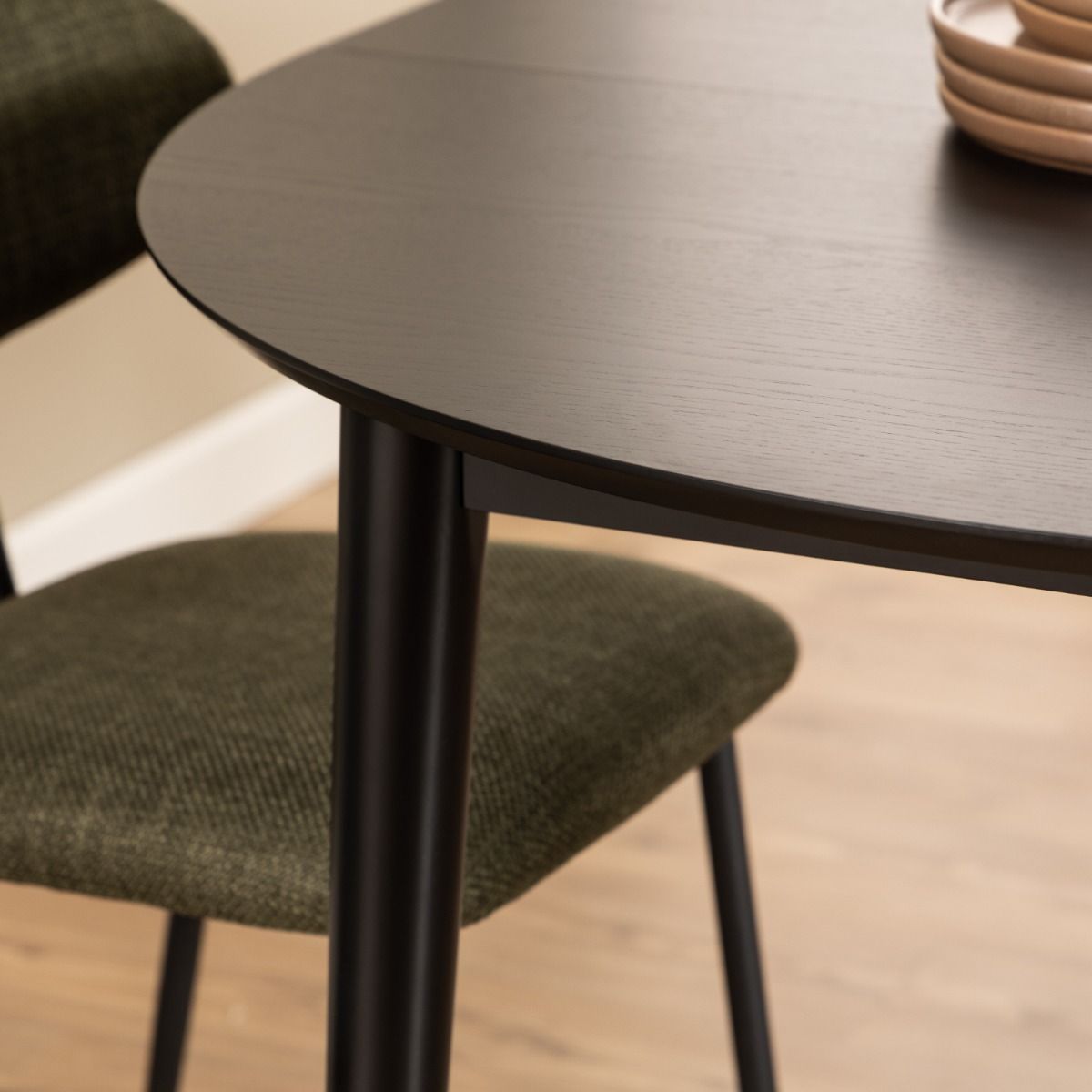 Montreux Round Extending Dining Table in Black 115-154cm includes 4 Cassandra Dining Chairs with Armrest in Black