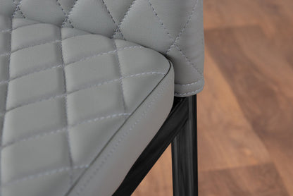 Novara Grey Concrete Effect Black Leg 120cm Round Dining Table & 4 Milan Black Leg Chairs